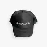 Signature Black Trucker Hat